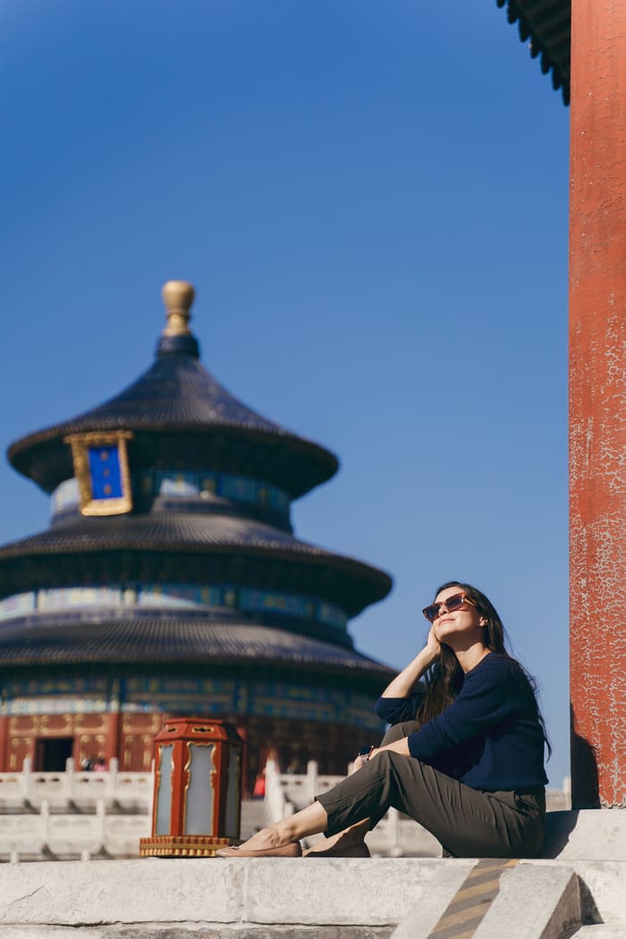 mujer sentada en Beijing